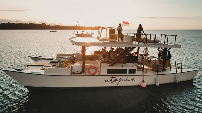 Utopia Catamaran cruise at sea in Nusa Lembongan during golden hour