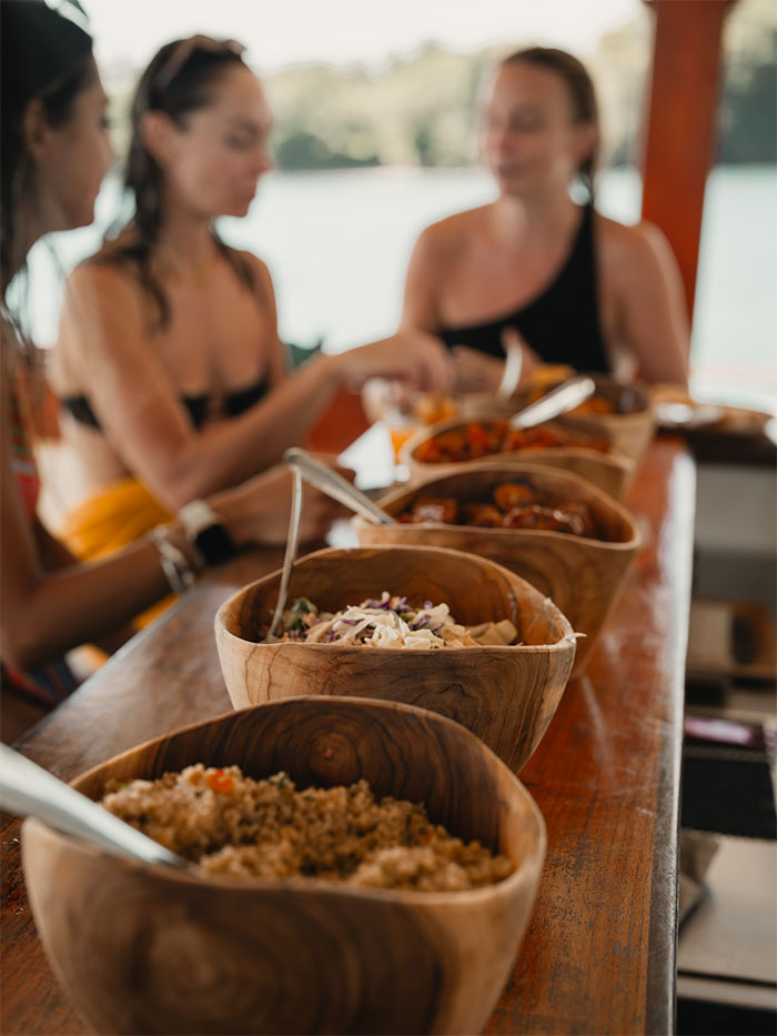 International buffet served onboard Utopia Catamaran Cruise with gourmet dishes and ocean views